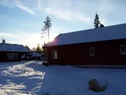 Sonnenaufgang im Schnee am Ferienhaus SLAPPE AV